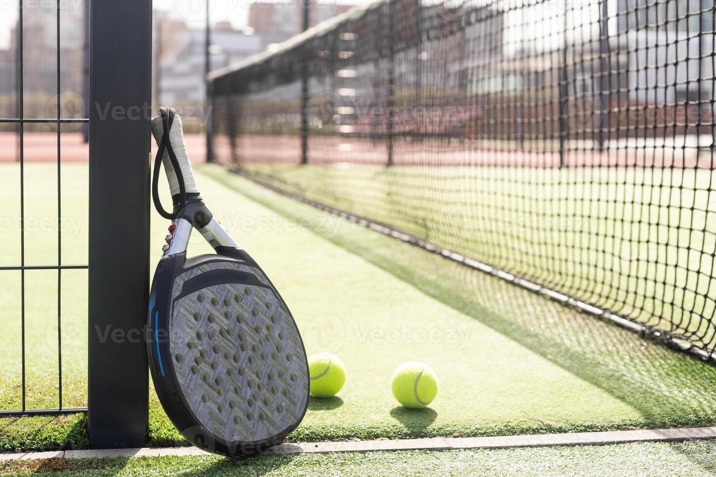 Paddle tennis racket and ball photo