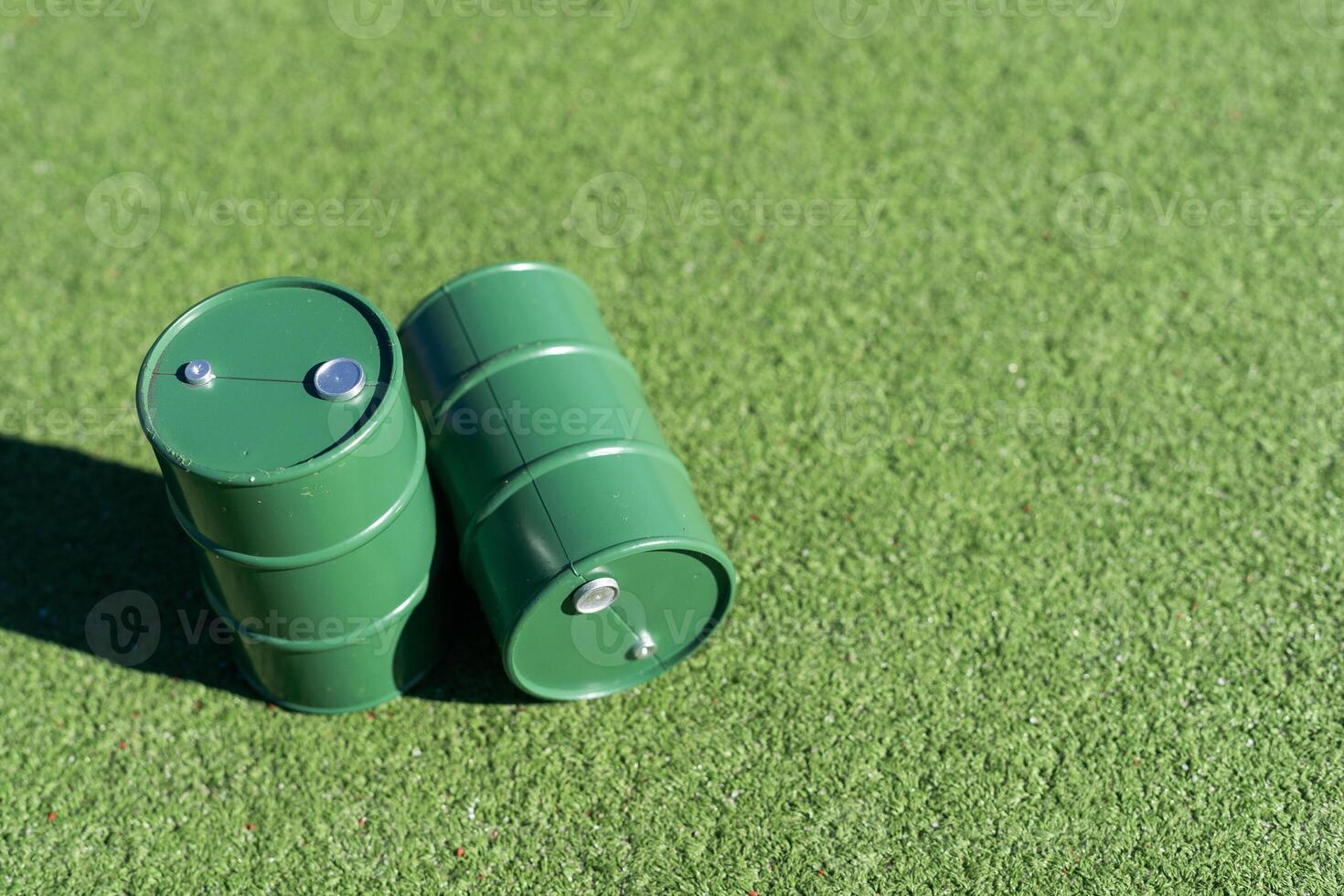 oil barrels on green background photo