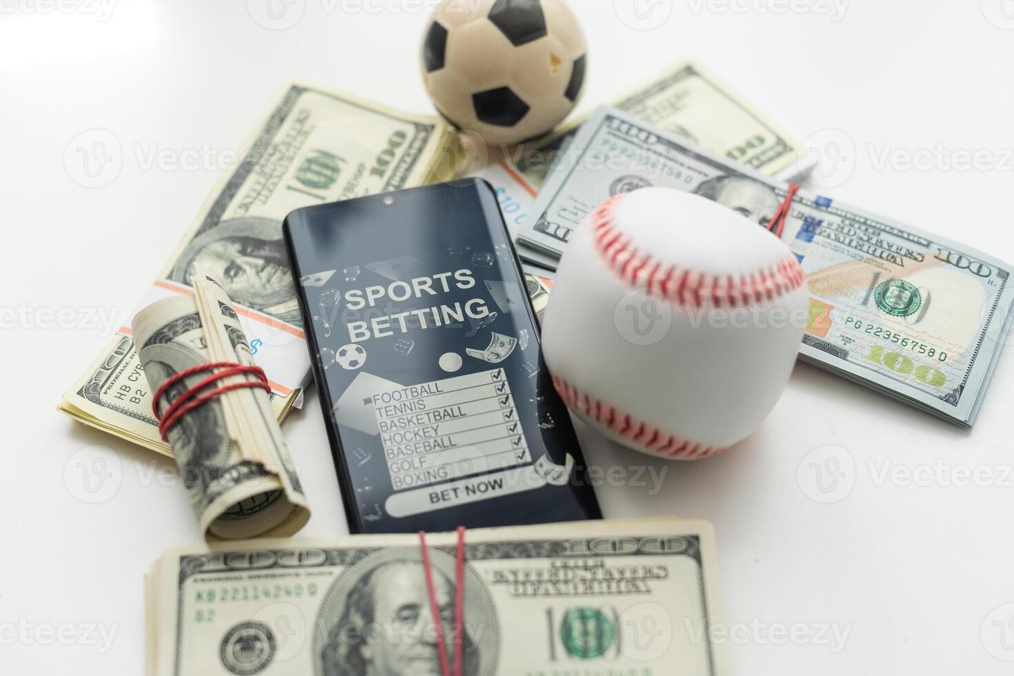 tablet pc with app for sport bets, on top of stacks of banknotes, white background, concept of online bets 3d render photo
