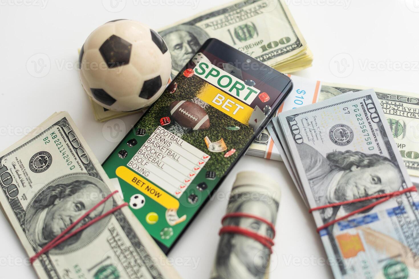 tablet pc with app for sport bets, on top of stacks of banknotes, white background, concept of online bets 3d render photo