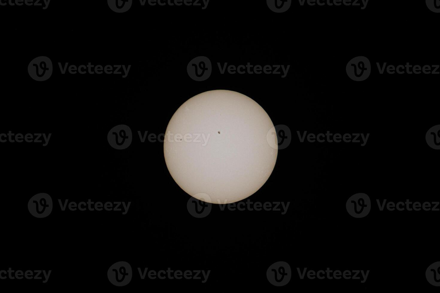 Total Solar Eclipse Beginning - Sun with Sunspots photo