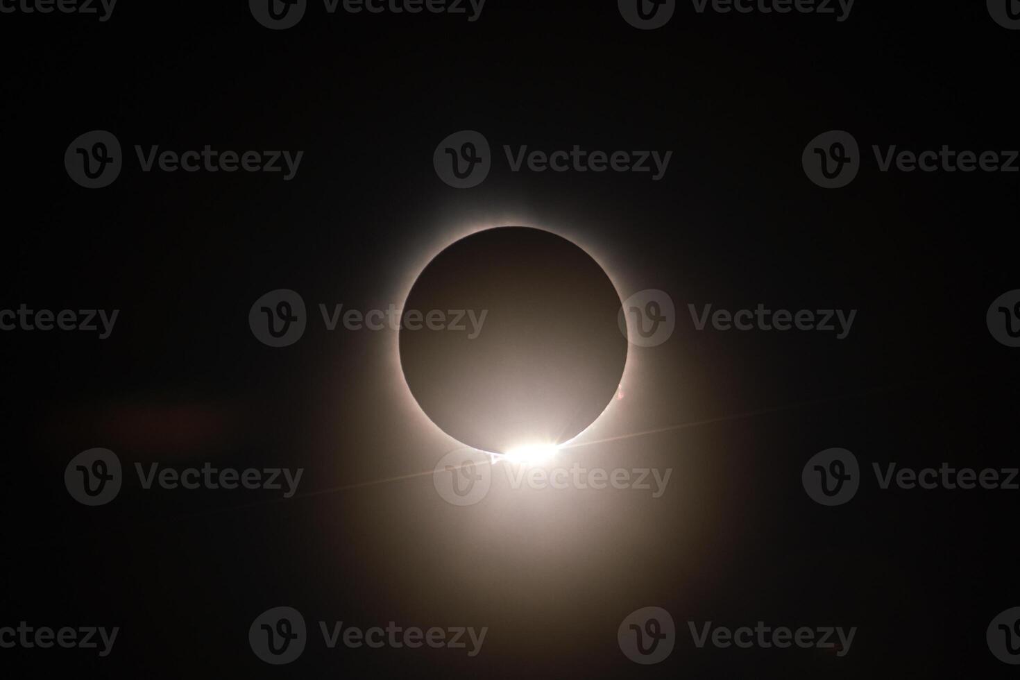 Total Solar Eclipse - Diamond Ring Just After Totality photo