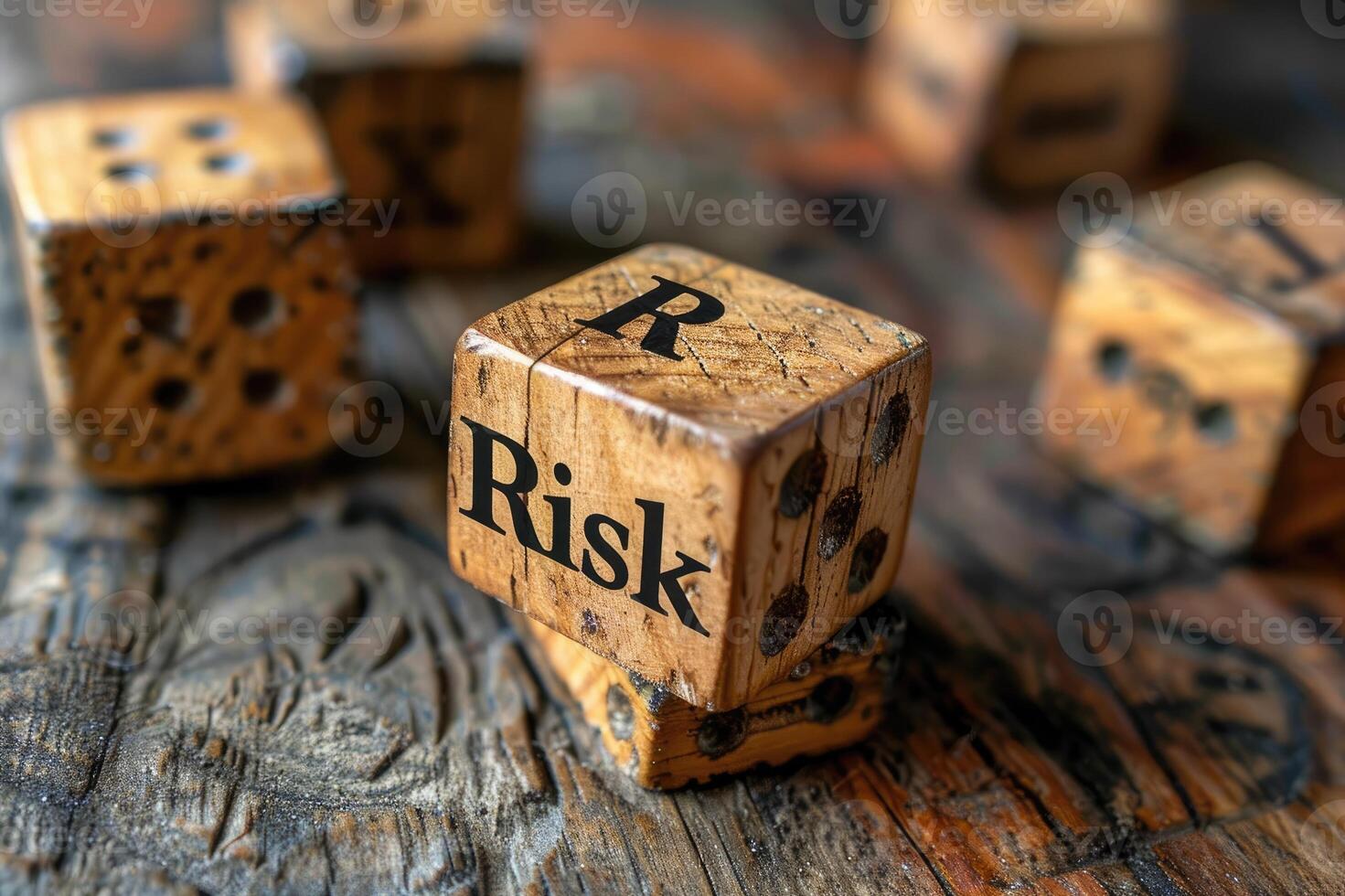 Wooden blocks spelling Risk on the table photo