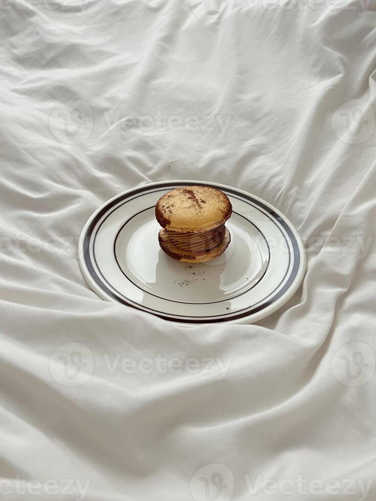 Macaron on Elegant White Plate photo