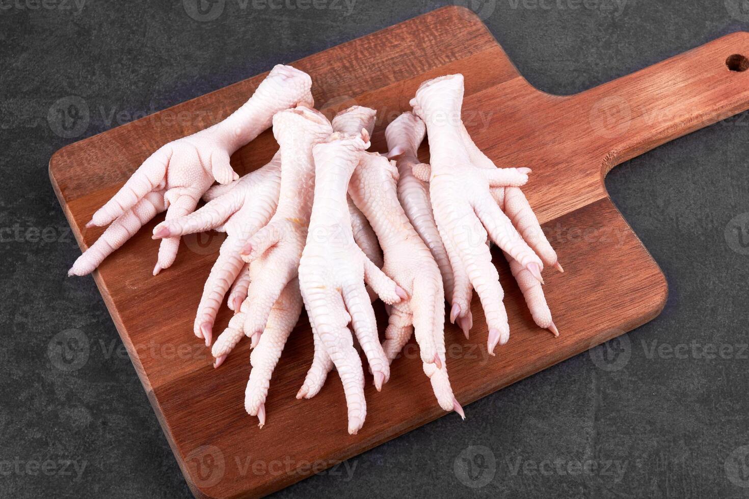 Raw chicken feet photo