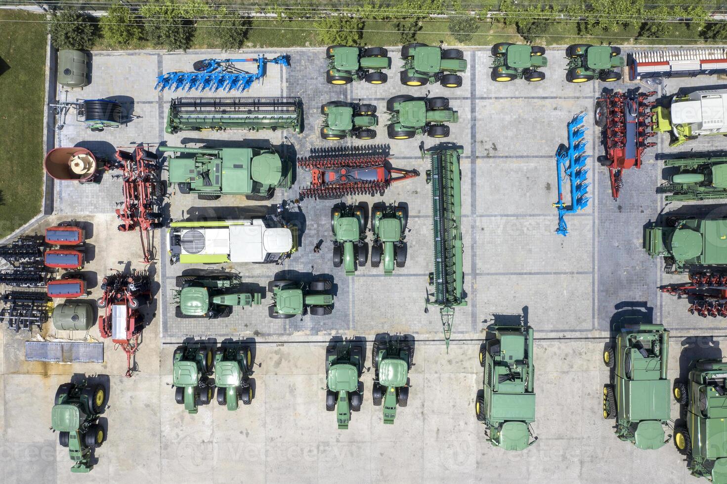 Aerial view of many different types of equipment for agriculture in storage at Targovishte town, Bulgaria photo