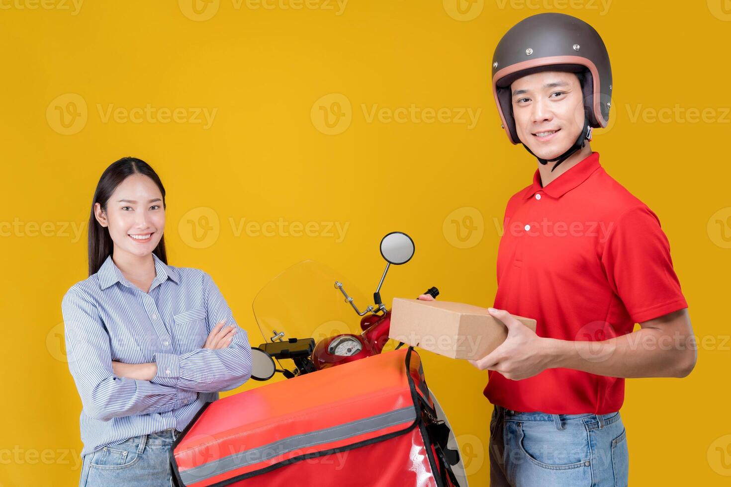 Delivery man handing over package to customer photo