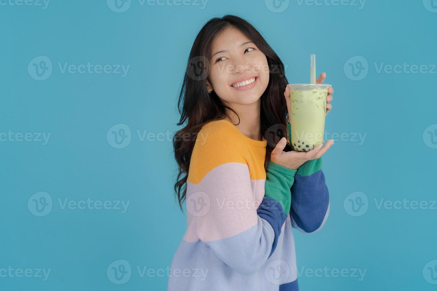 Young woman enjoying bubble tea photo