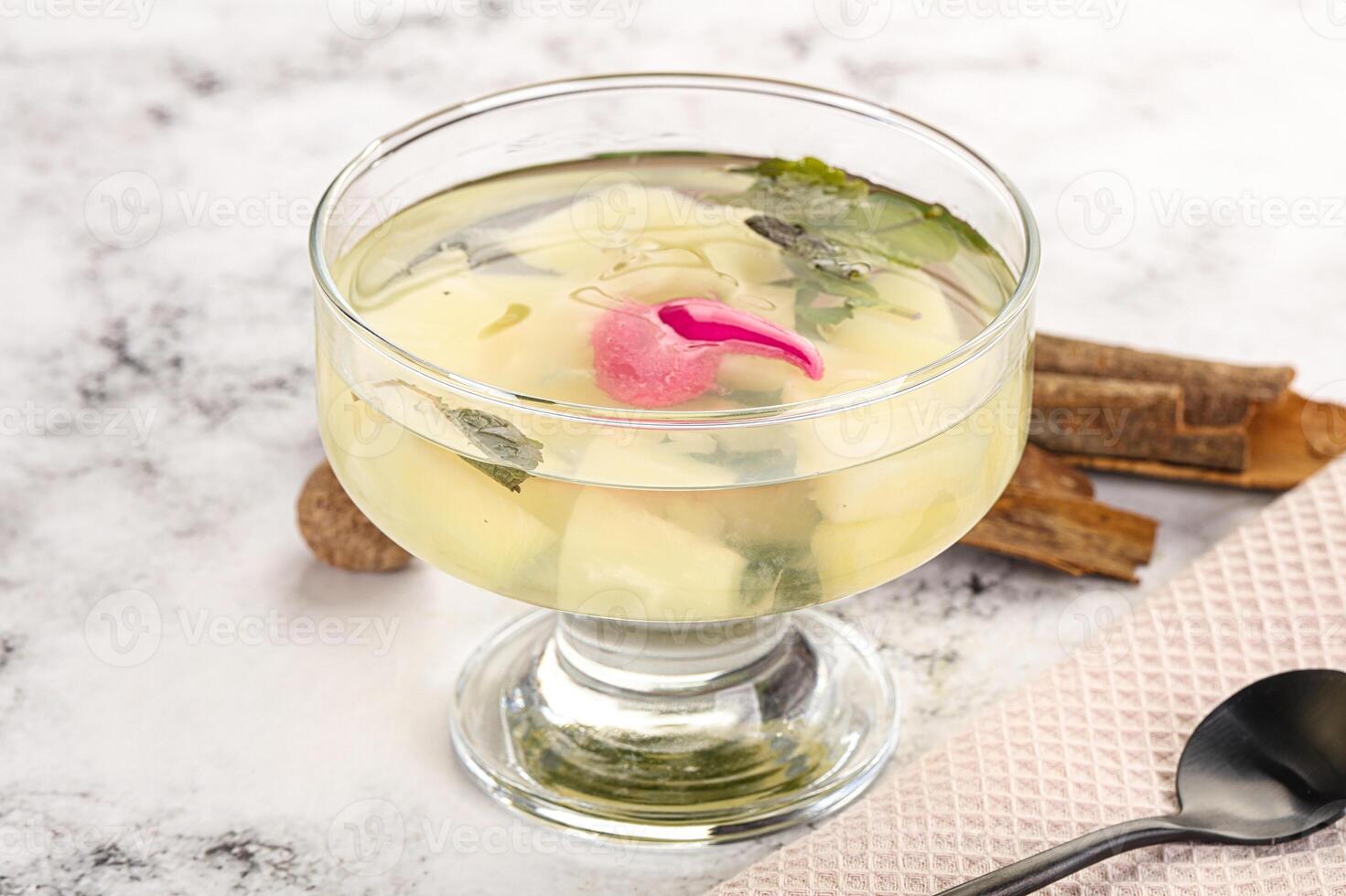 Sweet pineapple jelly with mint photo