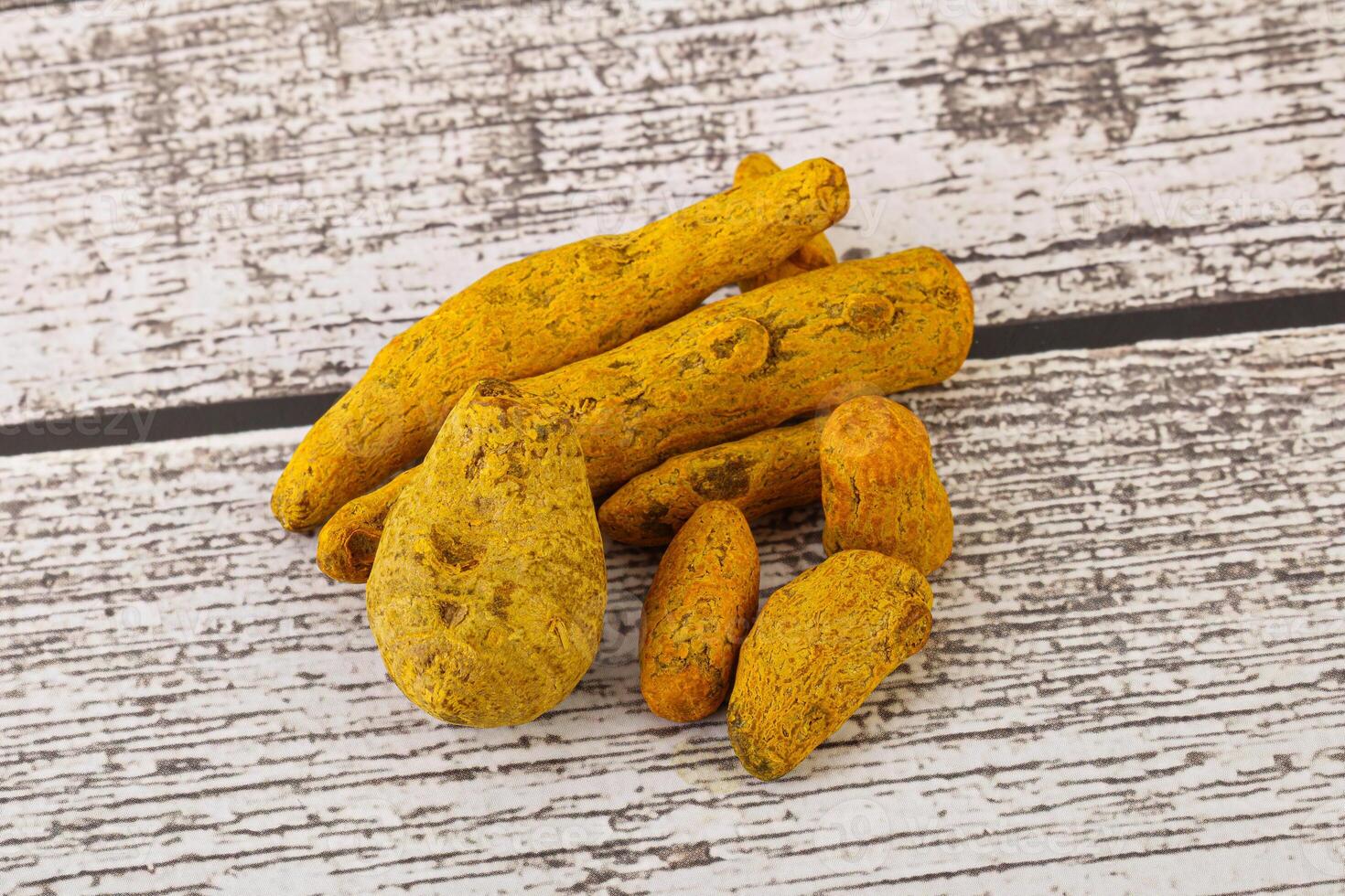 Indian spices - Turmeric root Curcuma photo