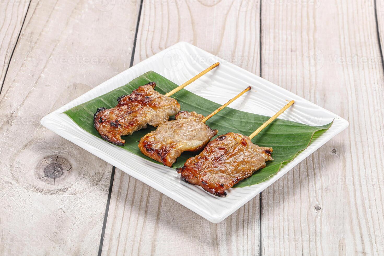 Thai cuisine - grilled pork skewer photo