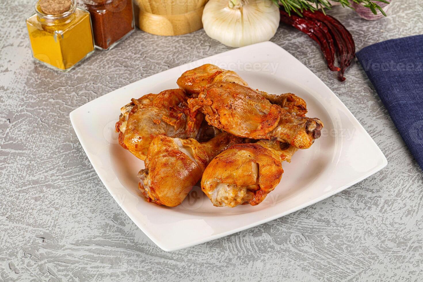 Raw marinated chicken drumstick for cooking photo