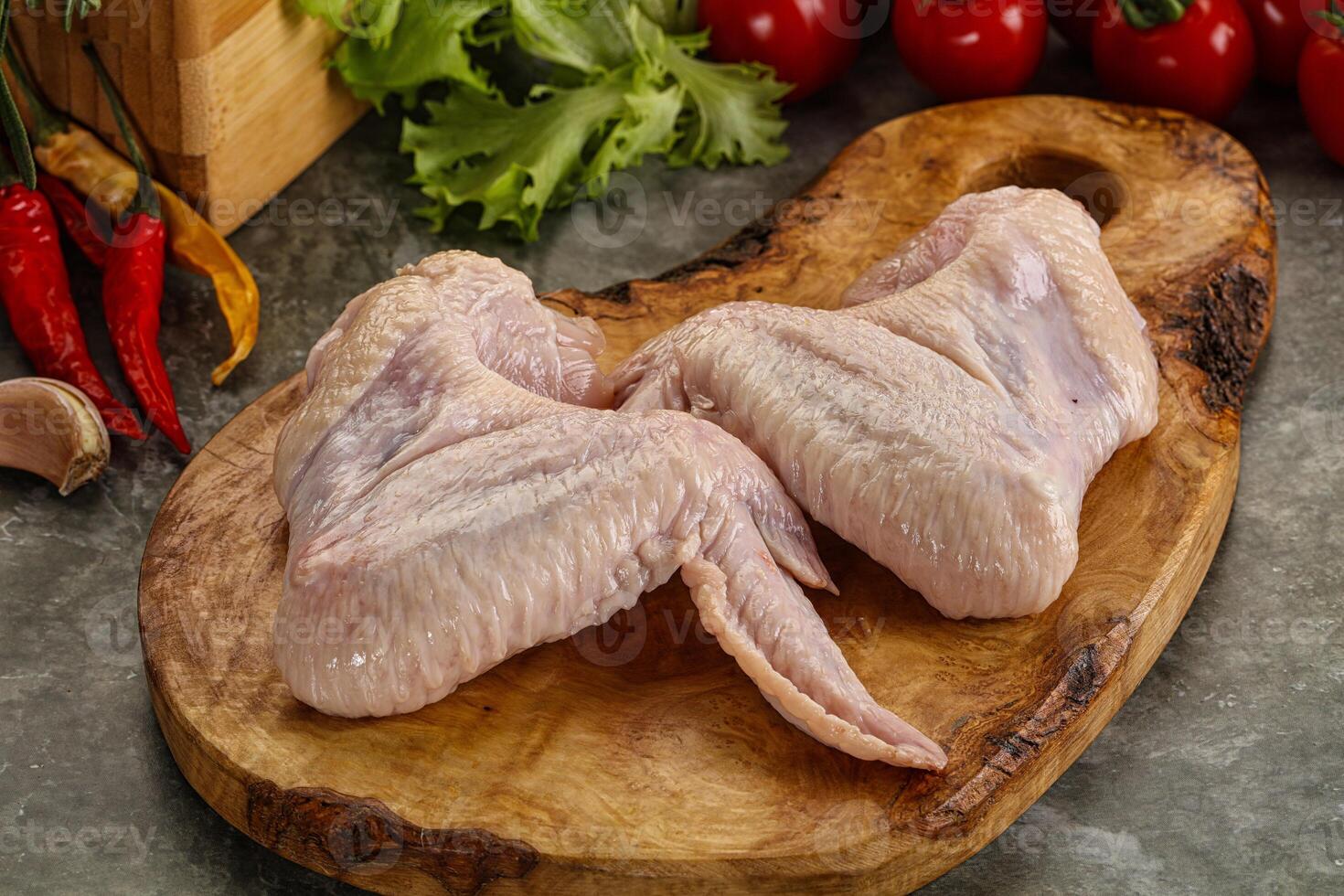 Raw chicken wings foe cooking photo