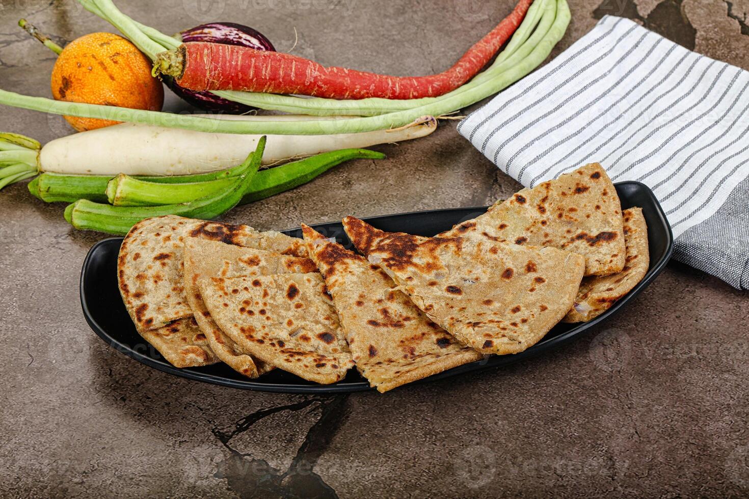 Indian Aloo Paratha - bread with potato photo