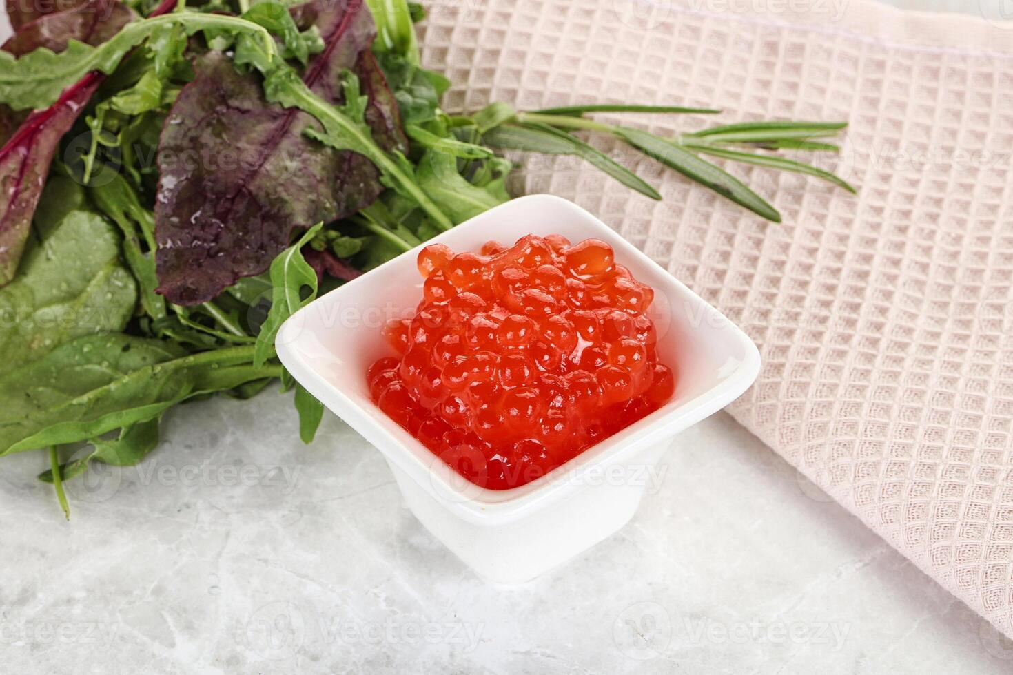 Red caviar in the bowl photo