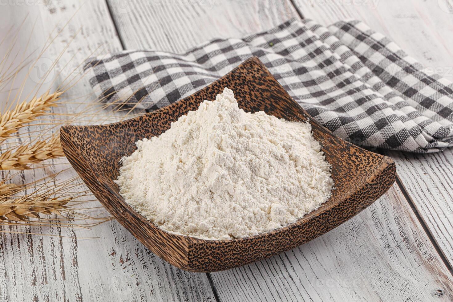 Wheat flour heap for bake photo