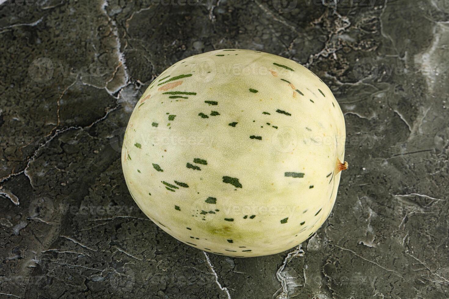 Ripe sweet juicy Dalmatin melon photo