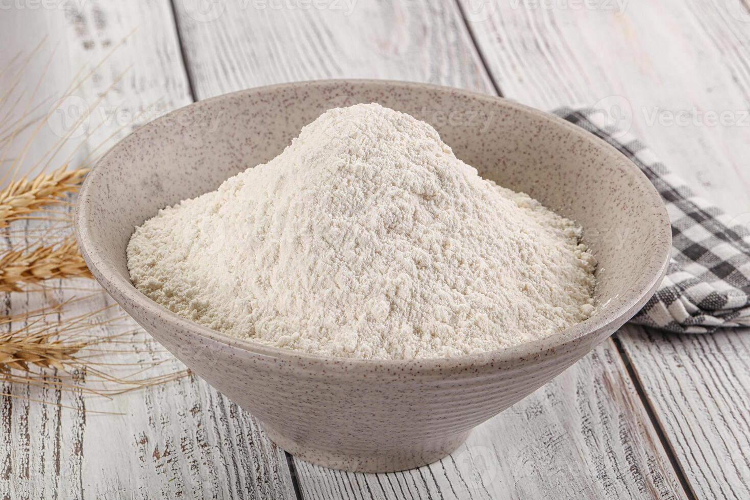 Wheat flour heap for bake photo