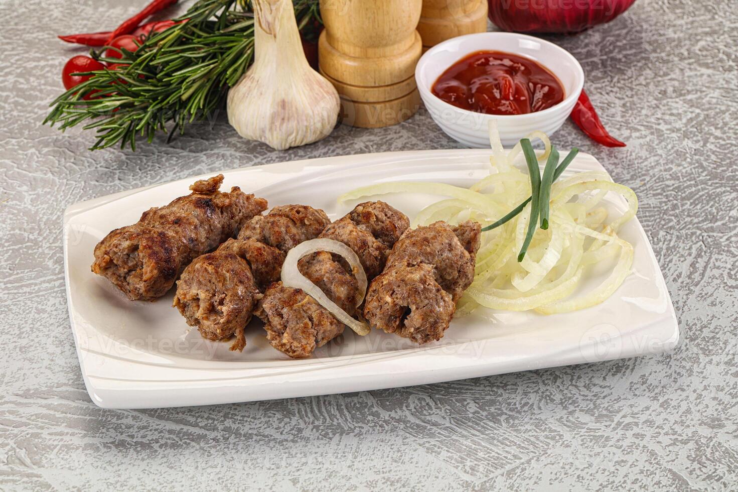 Beef kebab minced meat with onion photo