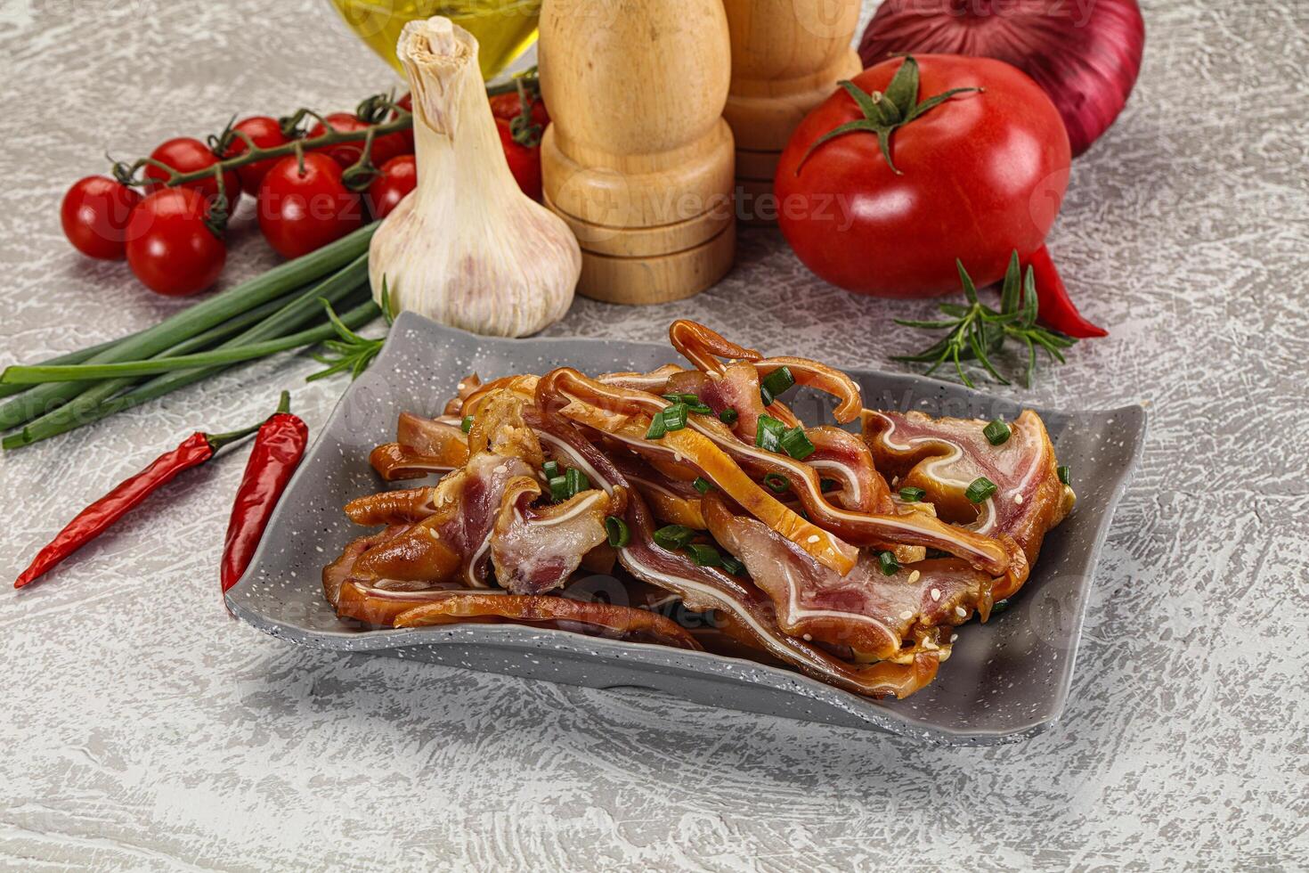 Sliced smoked pork ear snack photo