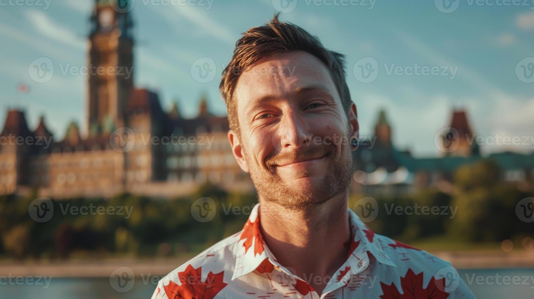 A man in a Canadian shirt smiling in front of a city, showing happiness and joy photo