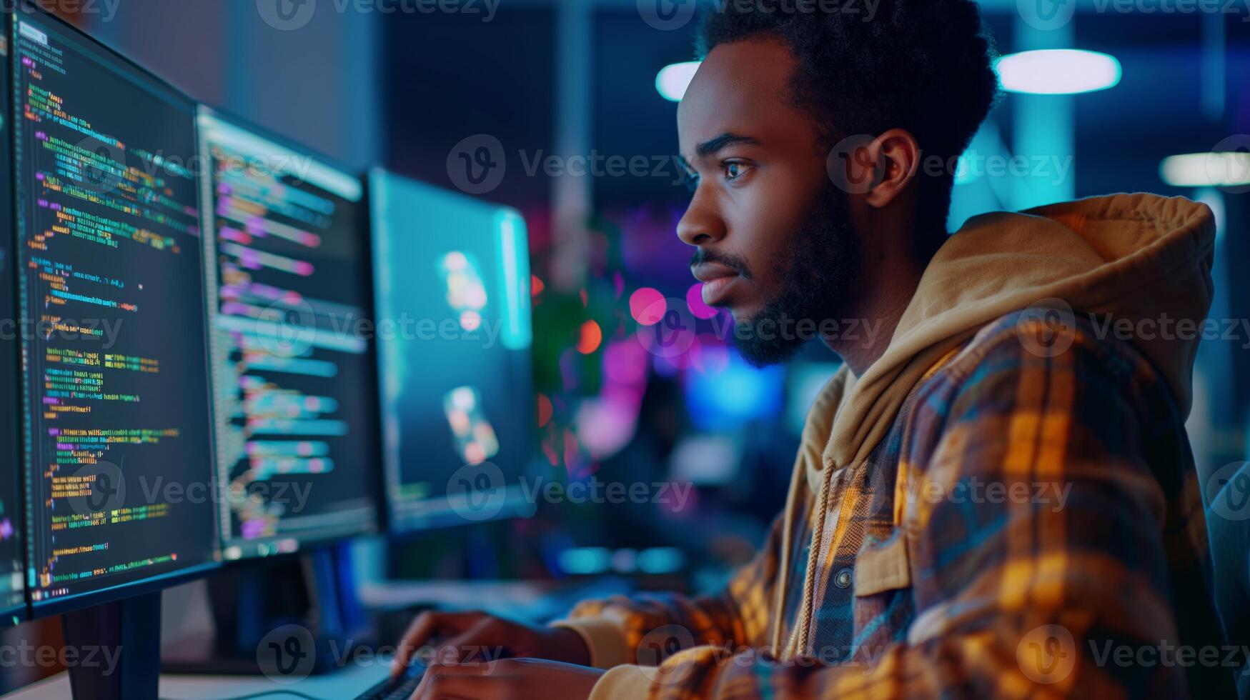 A man is in front of a computer monitor, enjoying music artist entertainment photo
