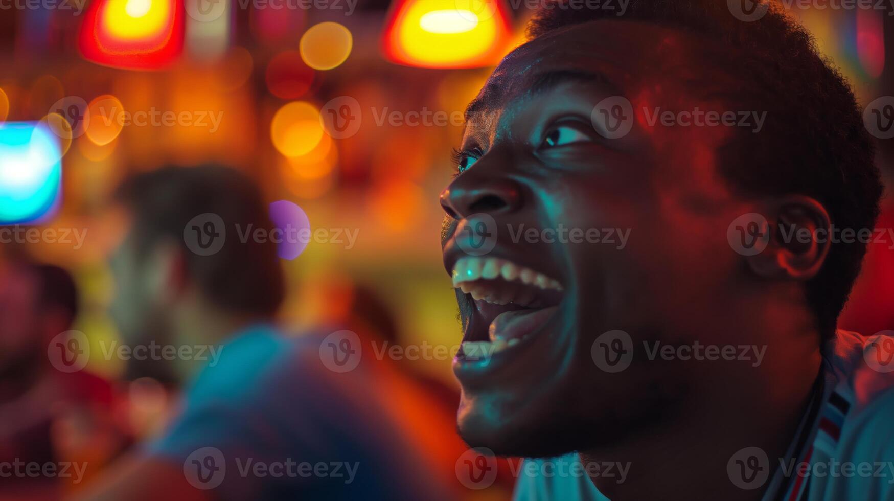 Close-Up of an Excited Soccer Fan Cheering in a Vibrant Bar during a Live Match photo