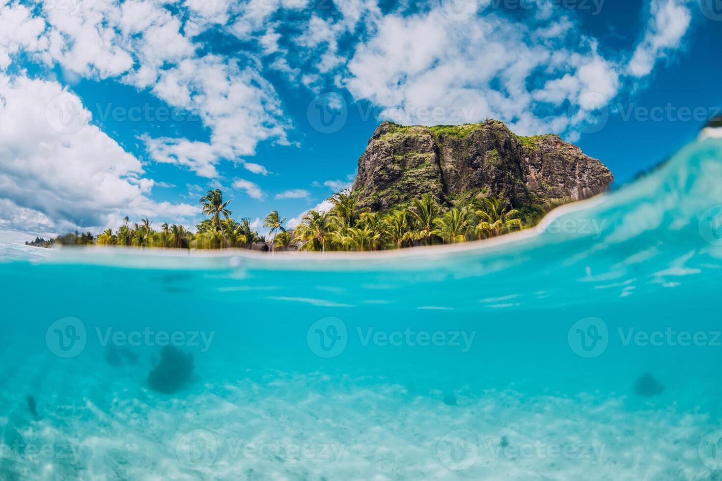 Tropical blue ocean with Le Morne mountain and luxury beach in Mauritius. Split view. photo