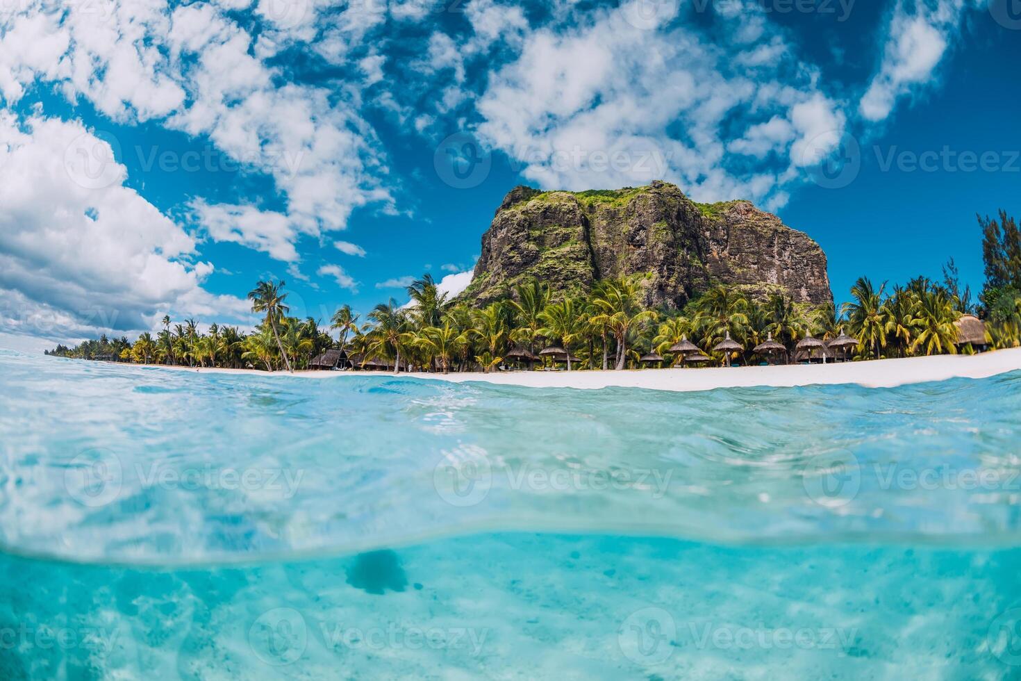Tropical transparent ocean with Le Morne mountain and beach in Mauritius. photo