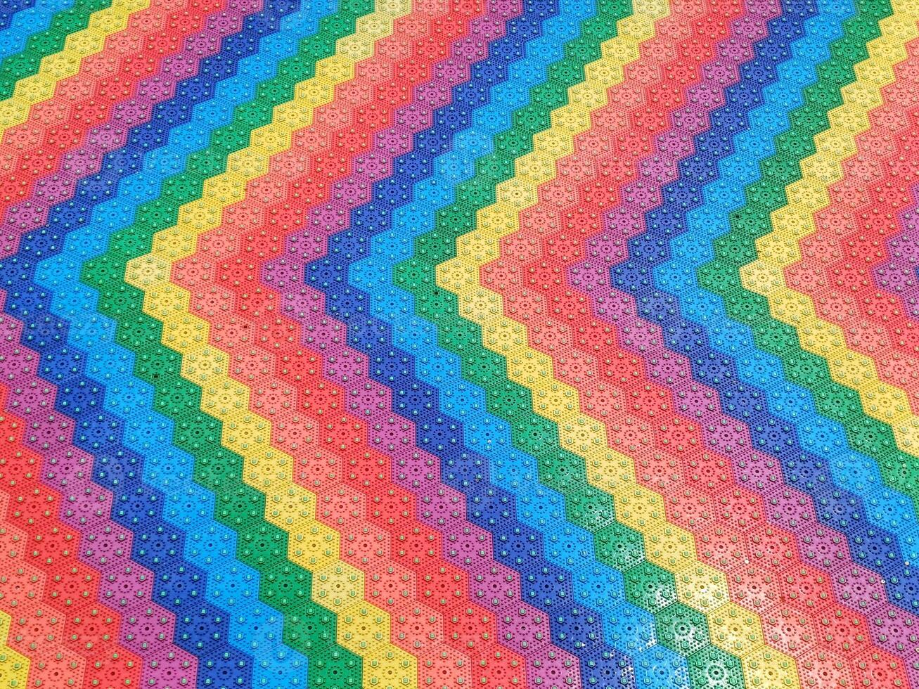 A colorful zigzag pattern on carpet photo