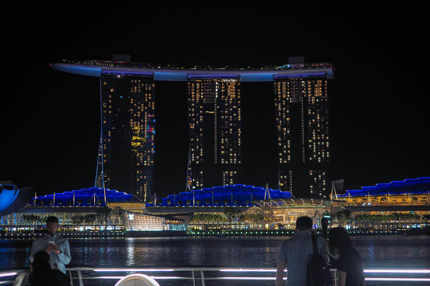 Singapore's Marina Bay nighttime skyline featuring the Marina Bay sands. photo