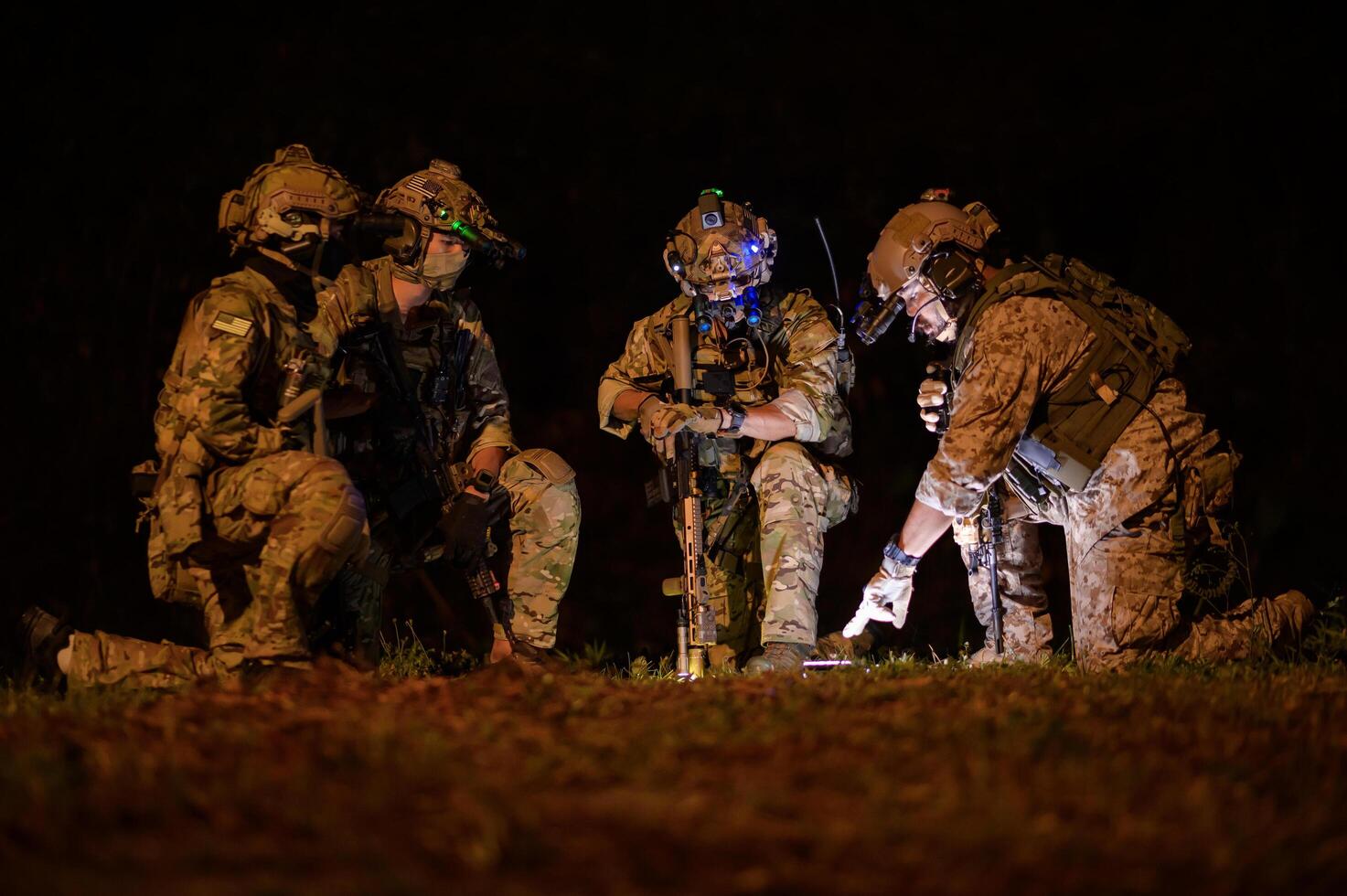 Soldiers ready to fire during Military Operation at night photo