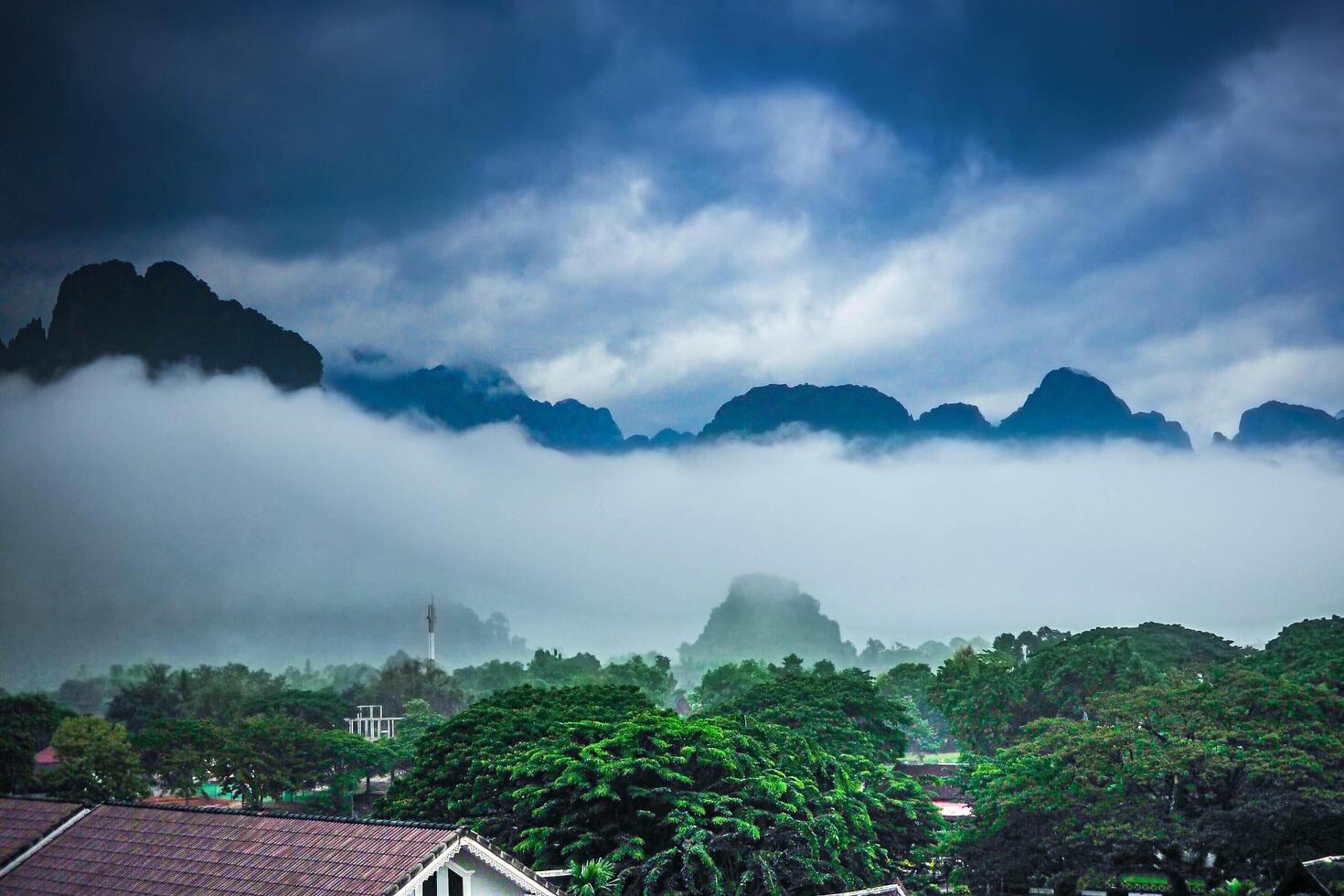 An aerial view of the foggy around mountains of Vang Vieng, Laos. Asia-Pacific. photo
