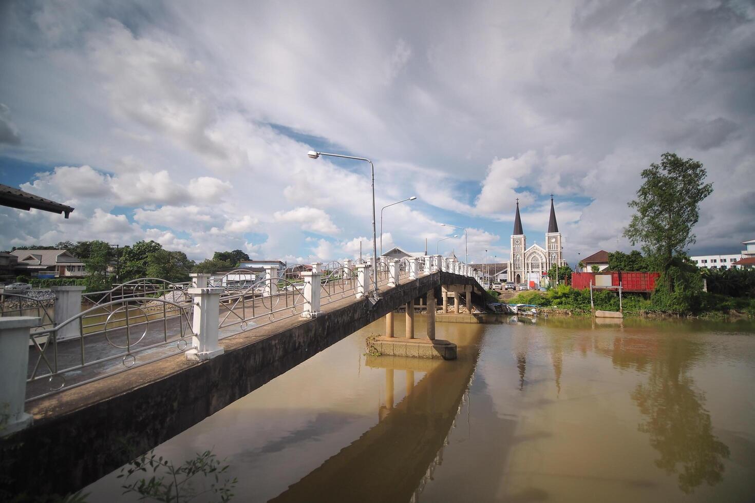River View with ancient church, the Baptist tower over the city skyline and Reflective Waters. photo