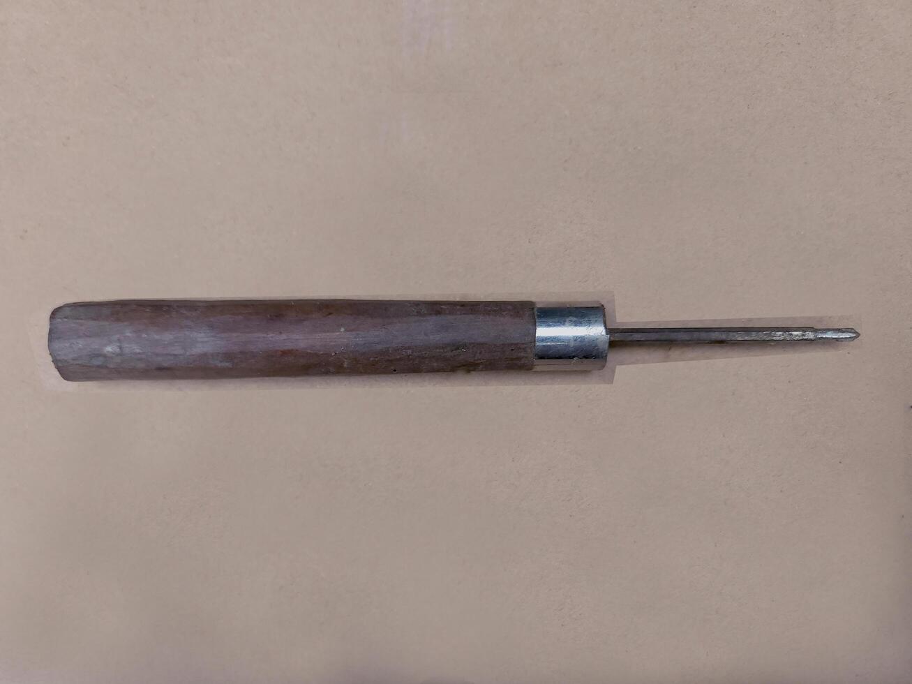 manual repair tool for opening bolts with a screwdriver, with a flat layout with a white background texture photo