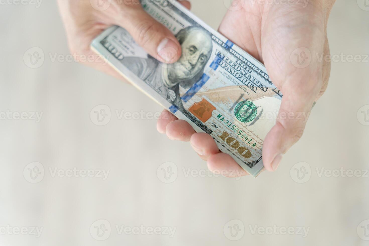 USD currency , Many dollar bank notes Placed on the table.The Dollar is the currency of USA that is used to change, buy, sell, accumulate, and invest in united kingdom's state people. photo