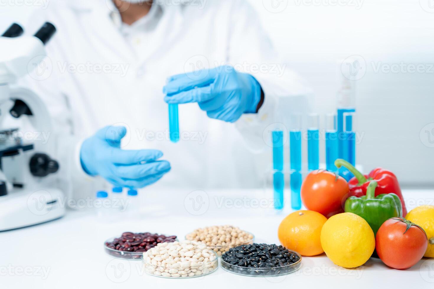 Scientist check chemical food residues in laboratory. Control experts inspect quality of fruits, vegetables. lab, hazards, ROHs, find prohibited substances, contaminate, Microscope, Microbiologist photo