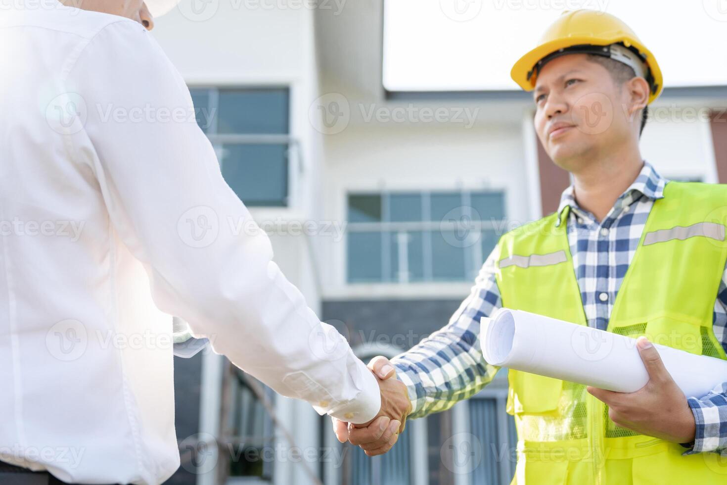 Construction team hands shaking greeting start up plan new project contract in office center at construction site, industry ,architecture, partner, teamwork, agreement, property, contacts. photo