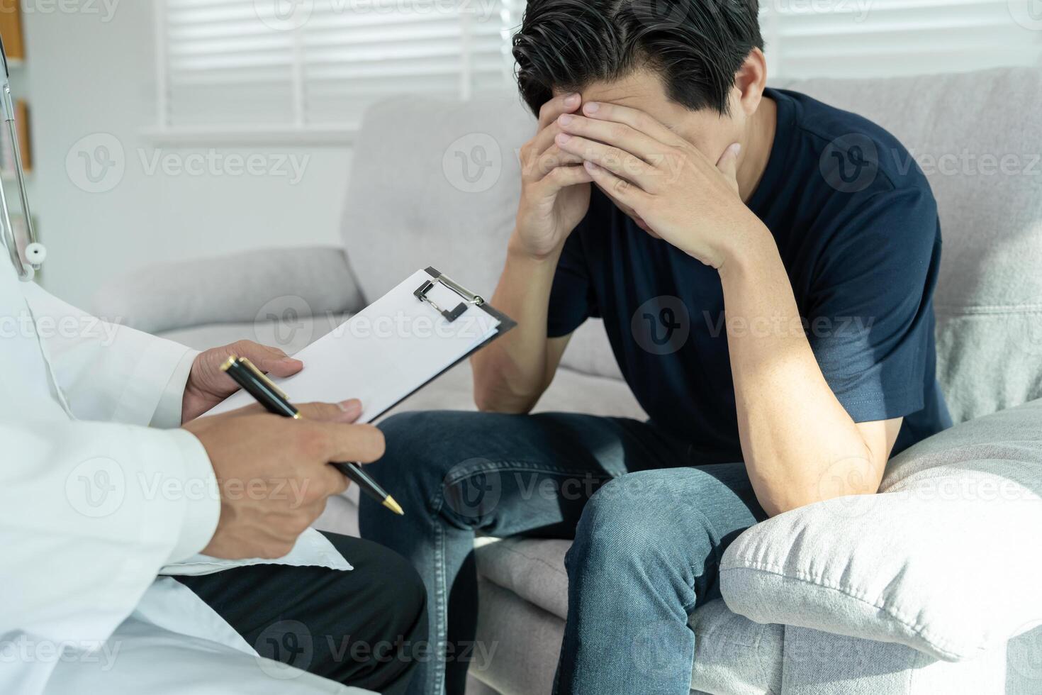 man with mental health problems is consulting. psychiatrist is recording the patient's condition for treatment. encouragement, love and family problem, bipolar , depression patient, protect suicide photo