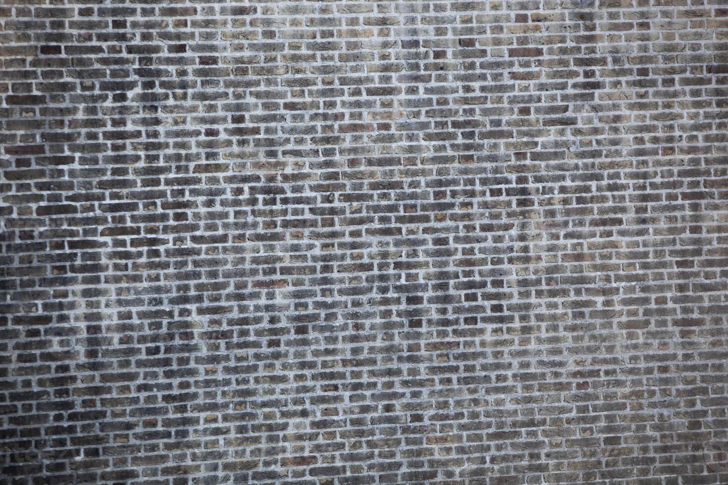 Stone texture in Lithuania. An ancient wall of stones in grey colour. Palace. Background. Template. For design. Horizontal. photo