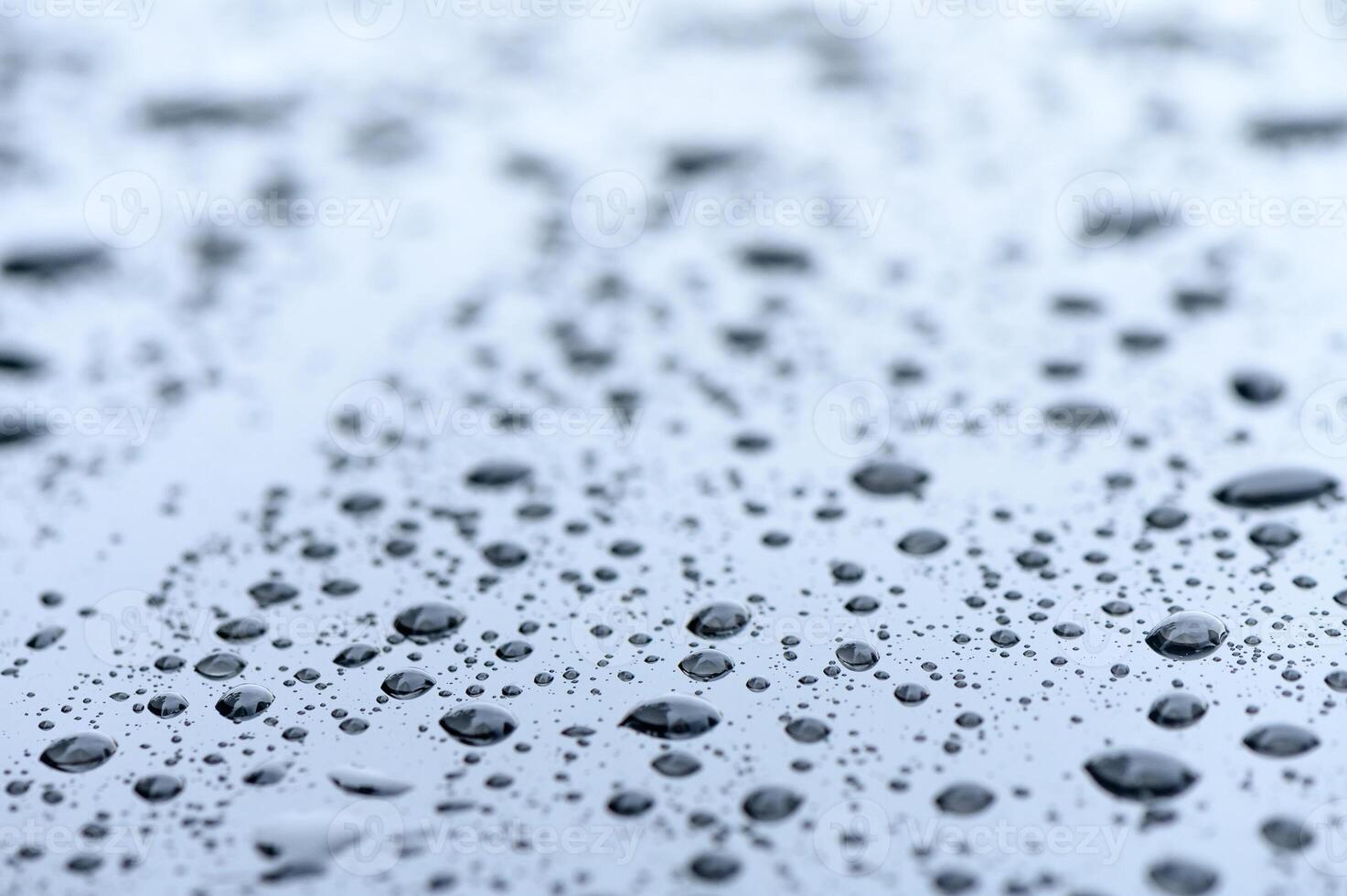 Raindrops on the windshield of a car 3 photo