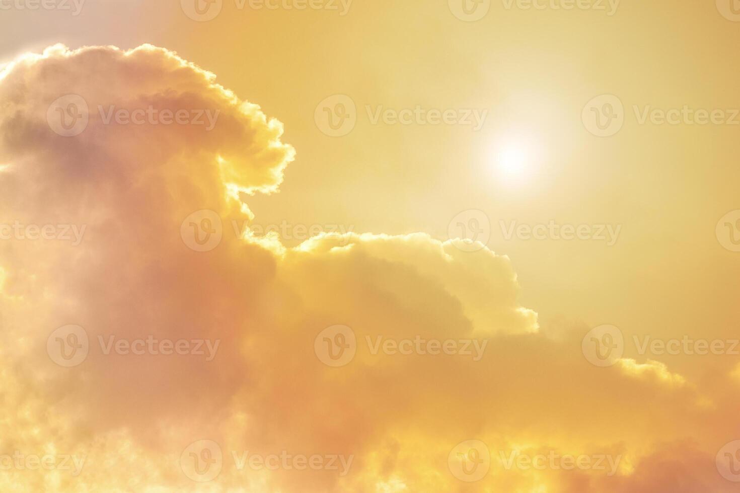 Fluffy cumulus clouds in the sunlight. Toned as background photo