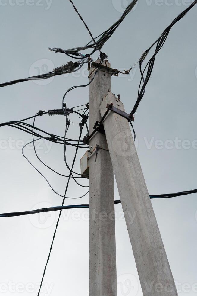 Top of a concrete power line support photo