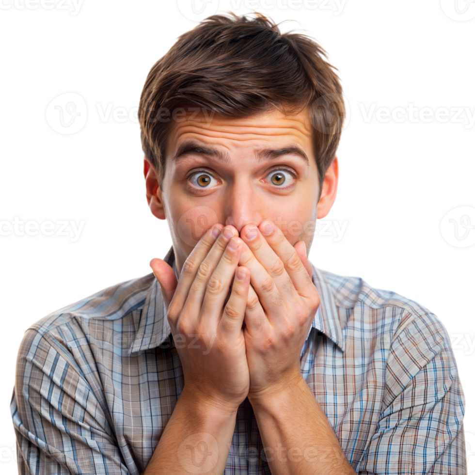 Young man in plaid shirt covers his mouth with both hands, eyes wide open in surprise, against a transparent background png