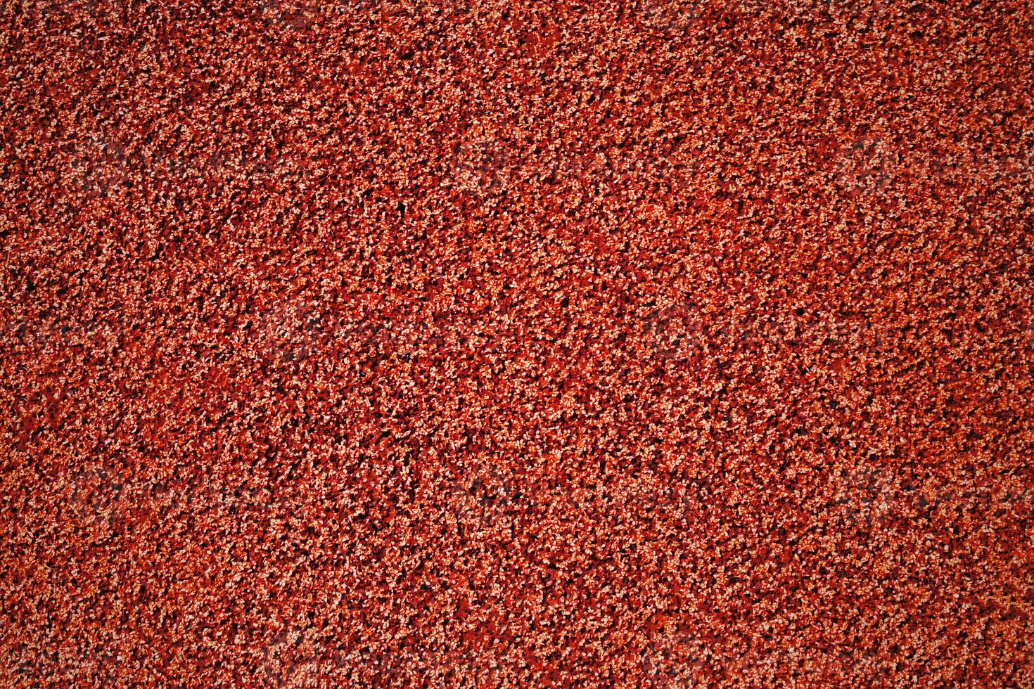 Rubber surface of athletics field as texture, background photo