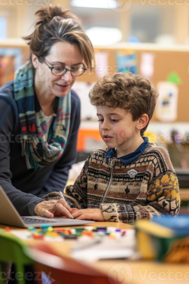 A focused image of a student using a speech-to-text device to complete an assignment, with a supportive teacher nearby, demonstrating accommodations for students with communication disabilities. photo
