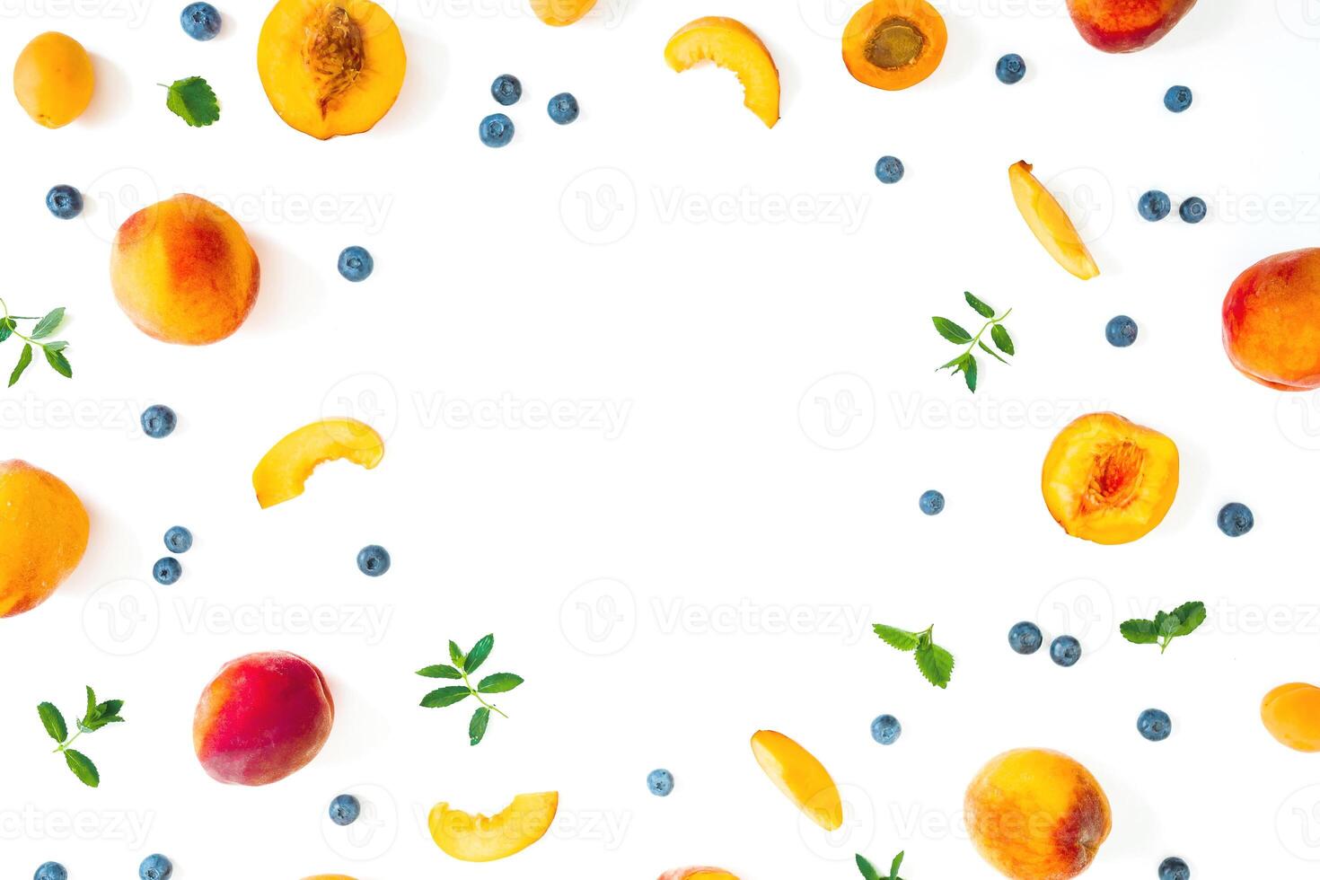 Peaches fruits with blueberry and mint on white background. Summer concept. Flat lay photo