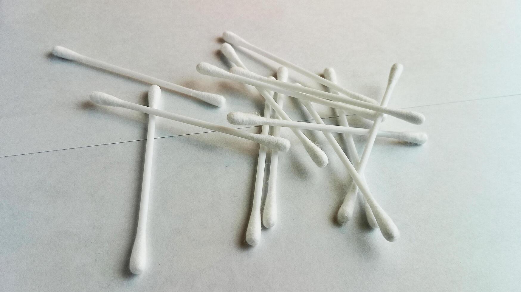 Clean cotton bud isolated on white, Cotton swab photo