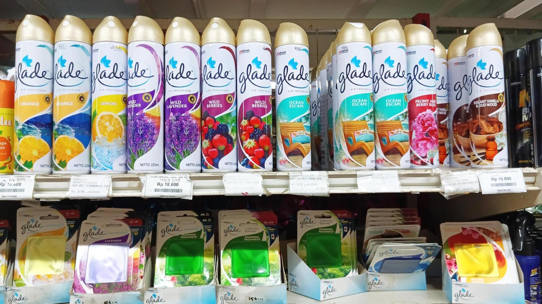 Semarang, Indonesia - May, 2024 - Rows of air fresheners are sold in shop windows photo