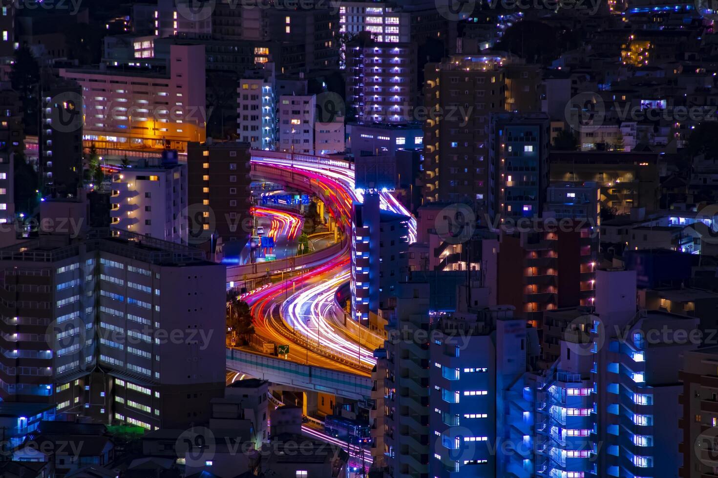 A night highway at the urban city in Tokyo long shot photo